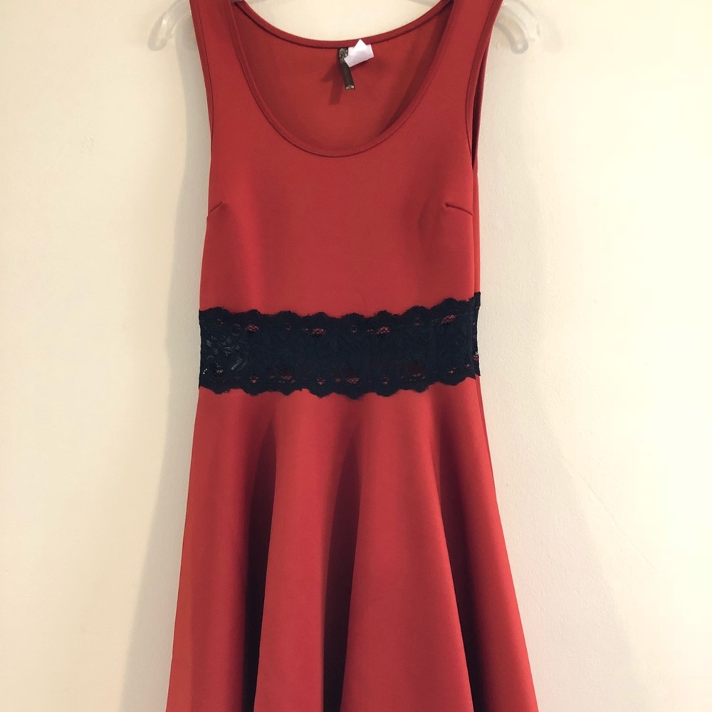 Orange woman’s lace cocktail dress